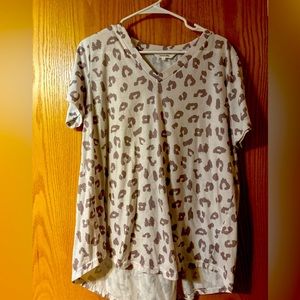 Like new animal print cream colored tee. Worn a couple times. Flowy and comfy